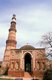 India: The Alai Darwaza (Alai Gate, built 1311 CE) next to the soaring minaret of the Qutb Minar, built in 1193, Delhi